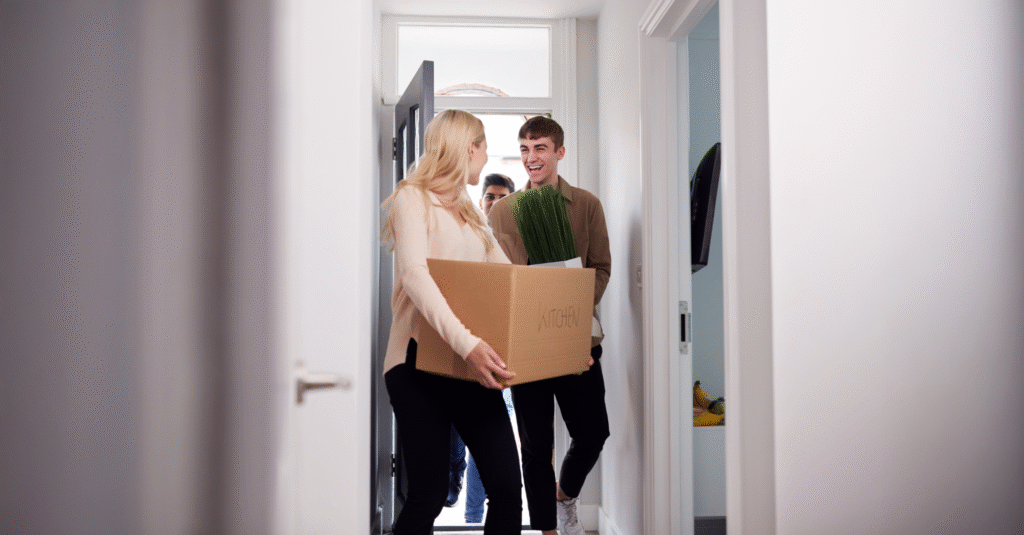 Young couple moving into a new house