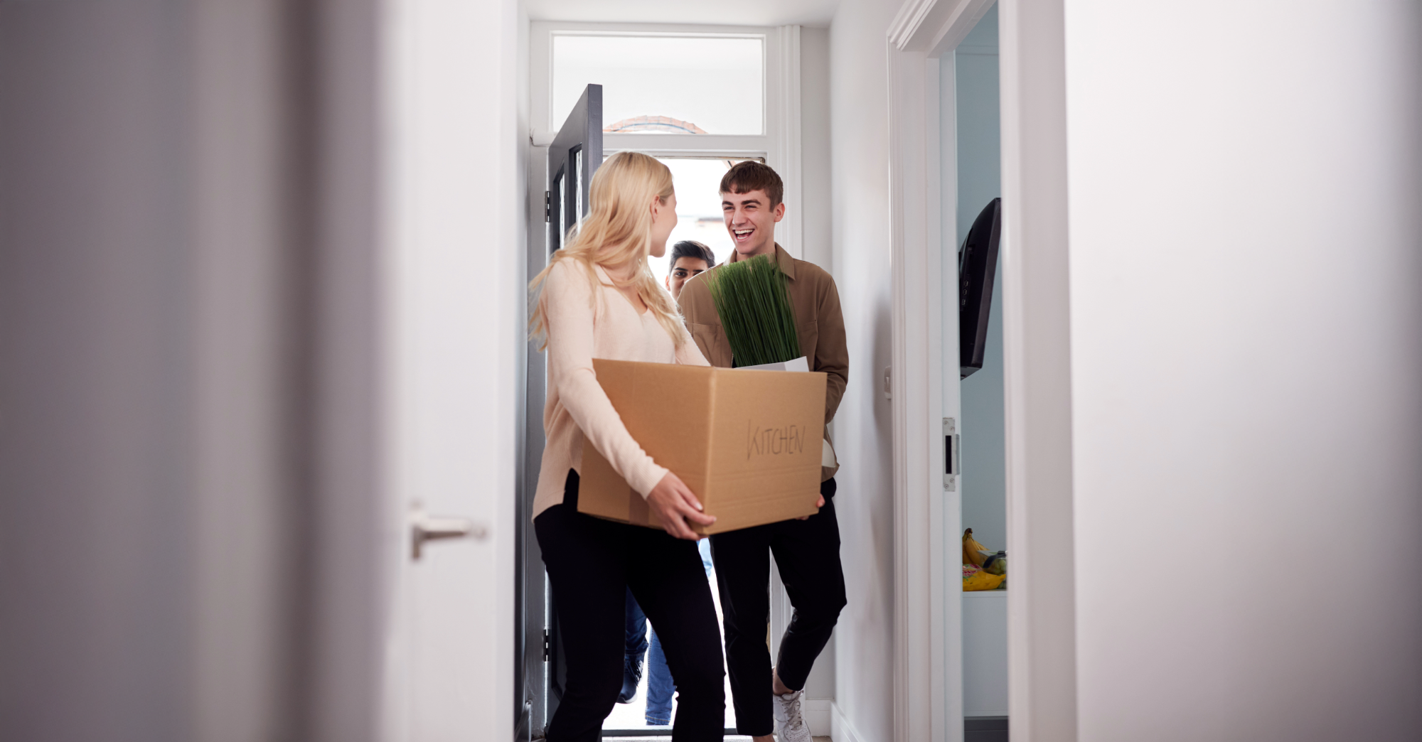 Young couple moving into a new house